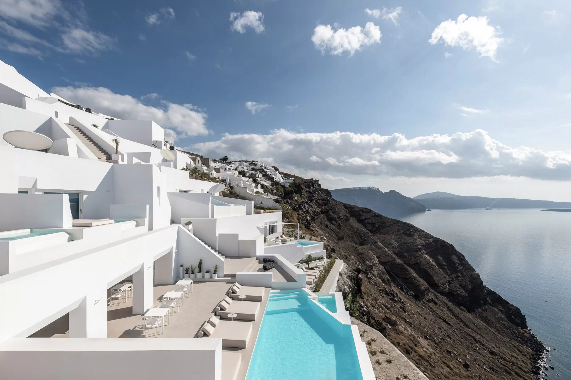 Katikies Santorini whitewashed cliffside pools in Oia