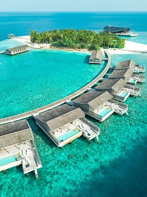 Kudadoo Private Island aerial overwater villas Maldives
