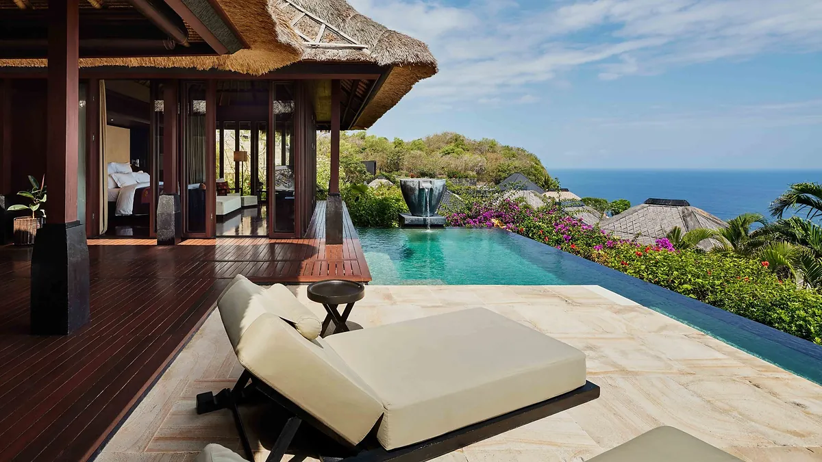 Ocean pool villa at Bvlgari Resort Bali with private plunge pool, loungers and a thatched pavilion above the sea