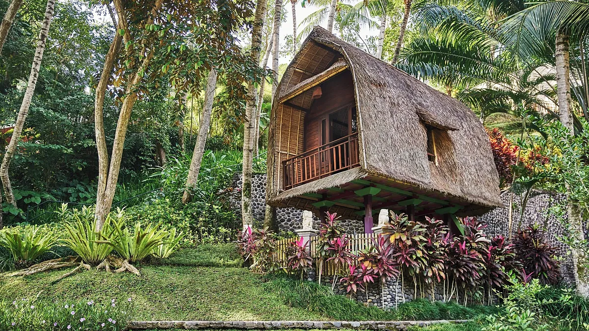 Thatched garden villa surrounded by jungle at Four Seasons Resort Bali at Sayan