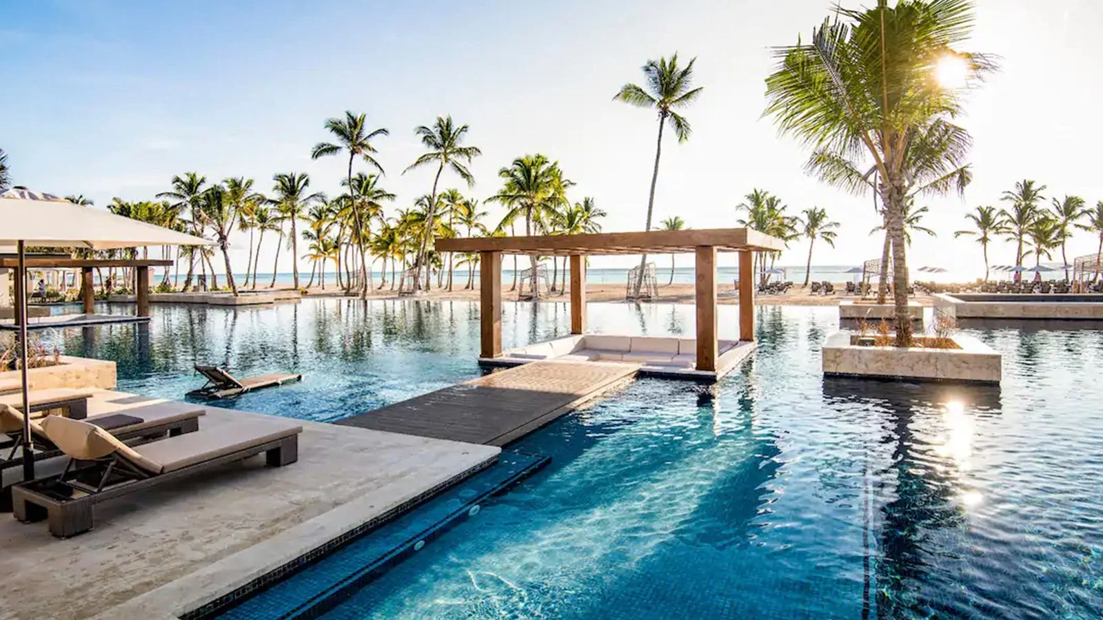 All-inclusive resort infinity pool above the sea