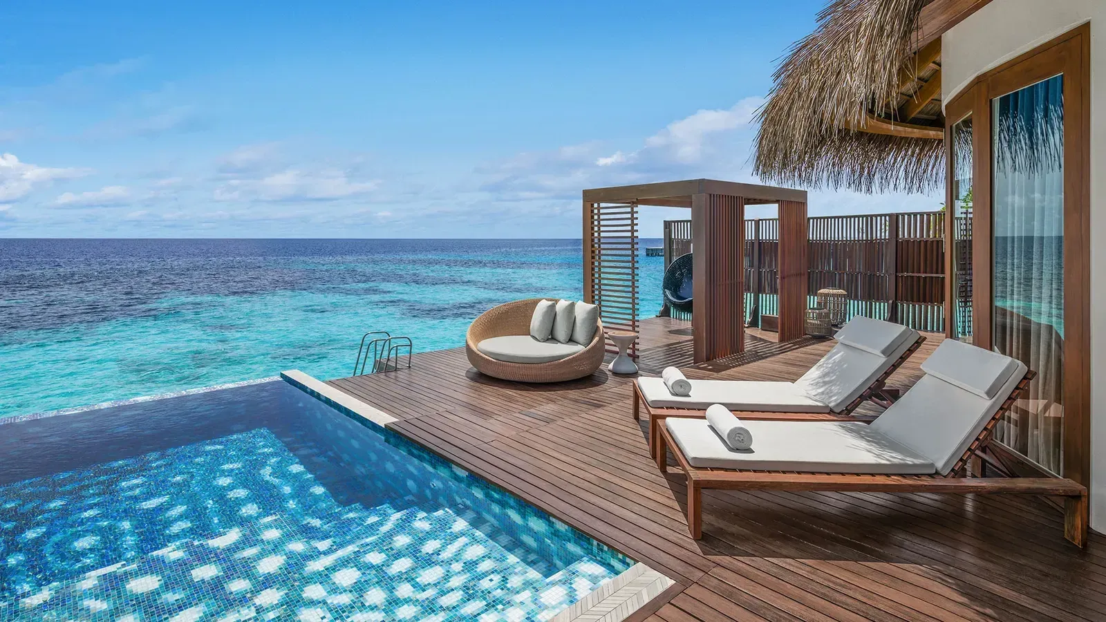 W Maldives overwater villa with private plunge pool above the lagoon