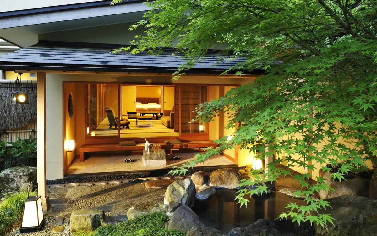 Gora Kadan, garden pavilion exterior with maples and stone lanterns, Hakone