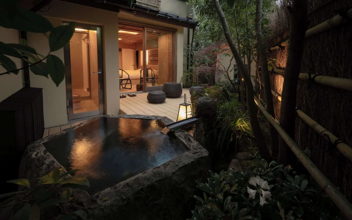 Gora Kadan, private open air rock bath at dusk, Hakone
