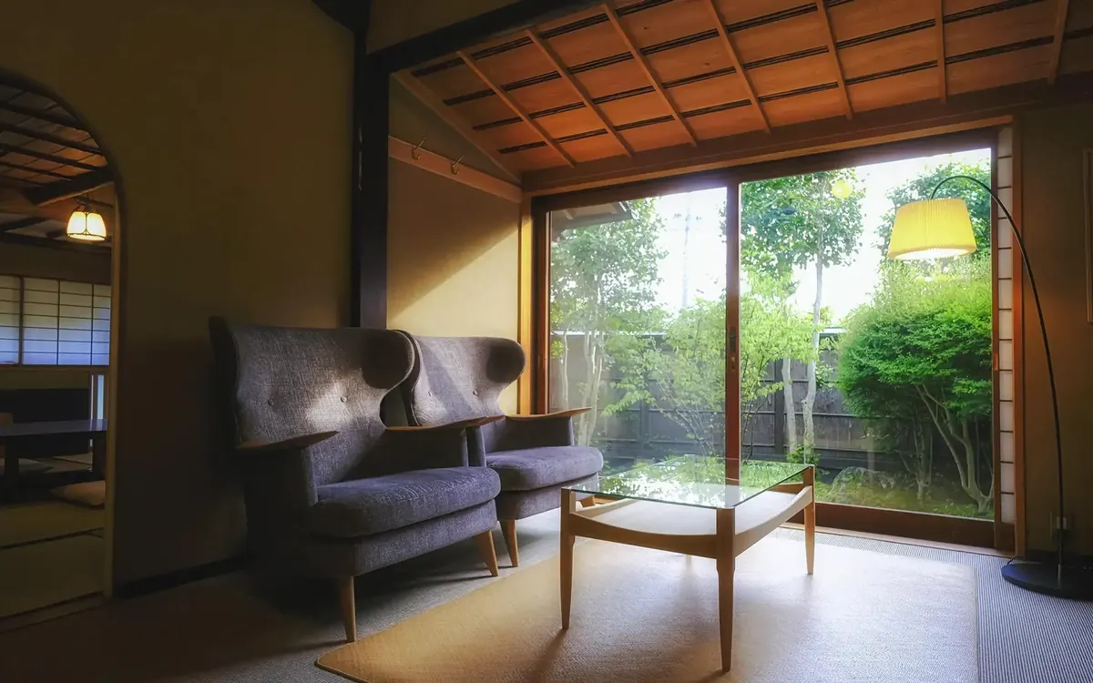 Sanso Murata, guest room lounge with garden view through shoji, Yufuin