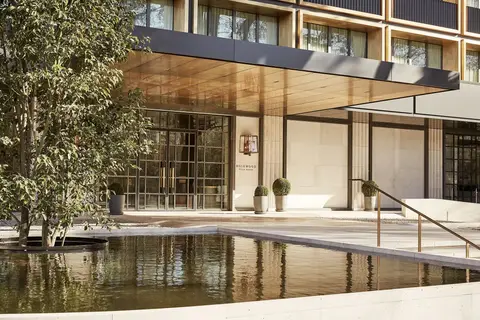 The entrance canopy and reflecting pool at Rosewood Villa Magna on the Paseo de la Castellana