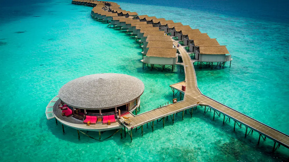 Aerial view of the water villa jetty at Centara Ras Fushi