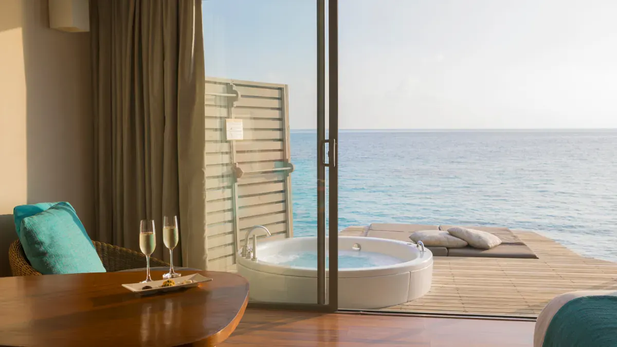 Ocean Pool Villa deck with tub at Centara Ras Fushi