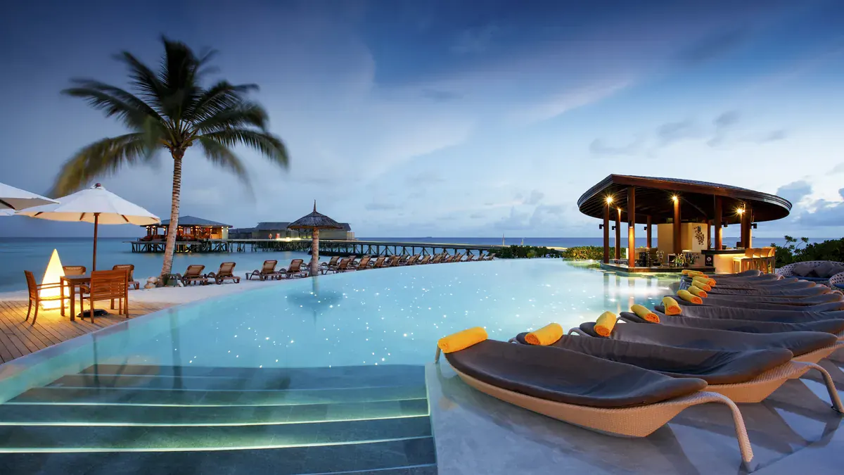 Infinity pool facing the lagoon at Centara Ras Fushi