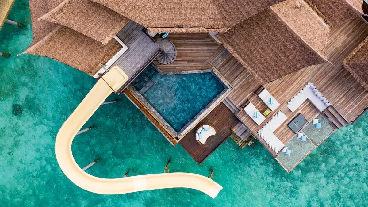 Aerial view of a slide villa at OZEN Reserve Bolifushi