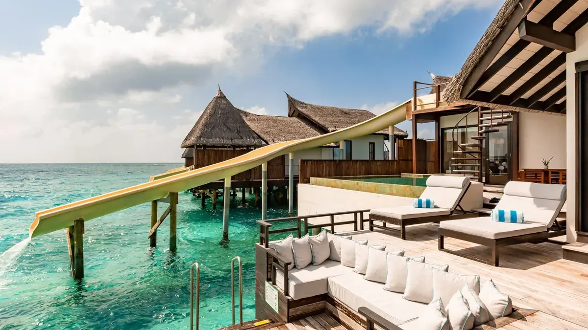 Slide from the upper deck into the lagoon at OZEN Reserve Bolifushi