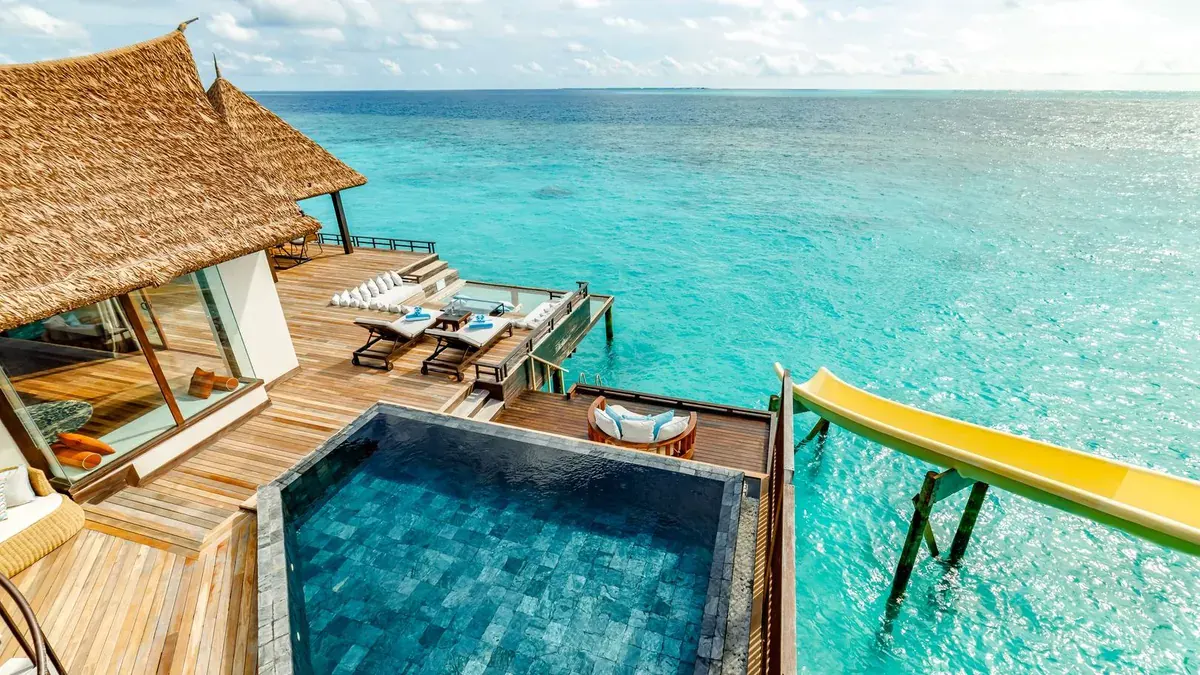 Private pool and slide on an Ocean Pool Suite at OZEN Reserve Bolifushi
