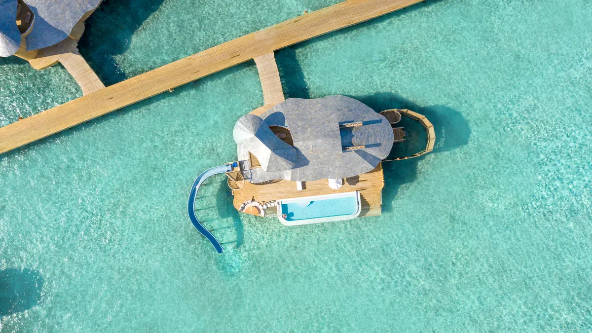 Aerial view of a Water Reserve slide at Soneva Fushi