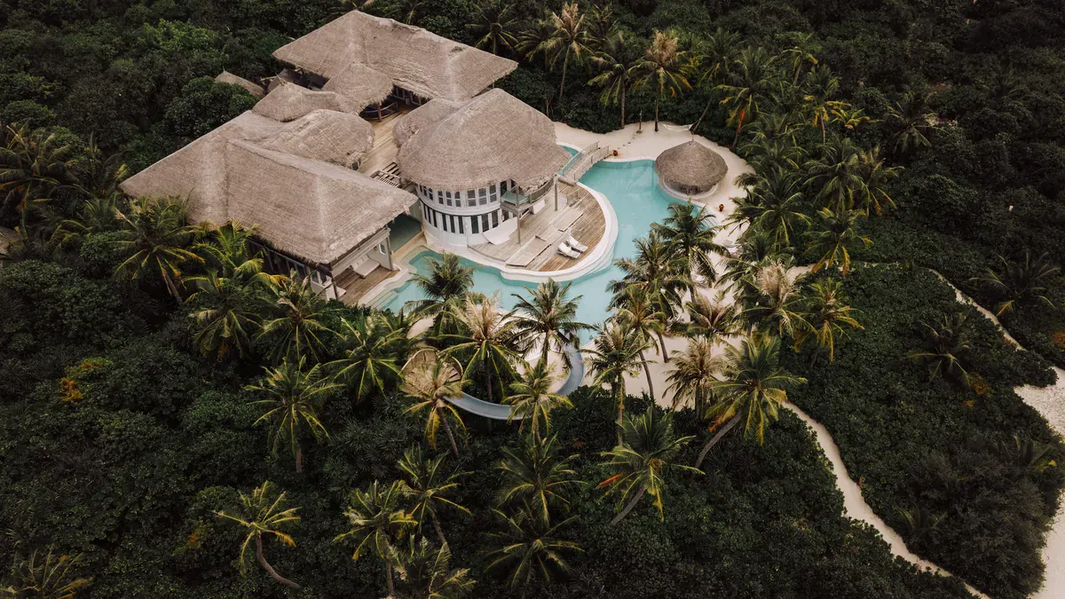 Aerial view of a villa and pool at Soneva Jani