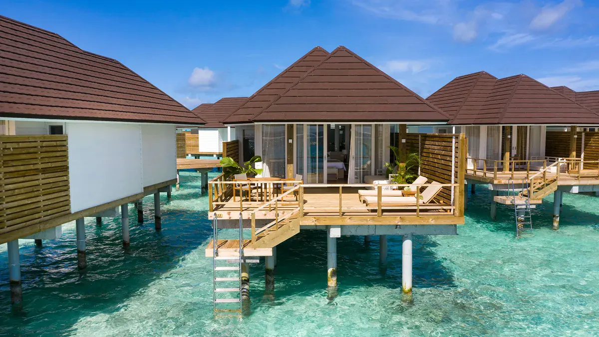 Water villas over the lagoon at Sun Siyam Olhuveli in South Malé Atoll