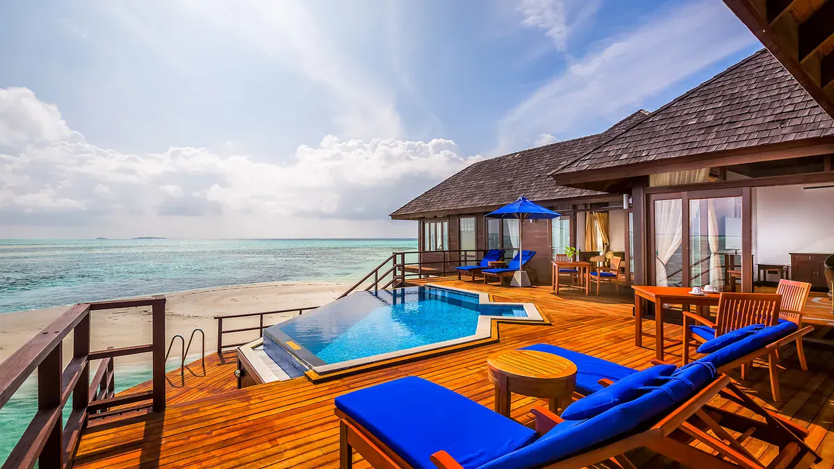 Water villa deck with pool at Sun Siyam Olhuveli