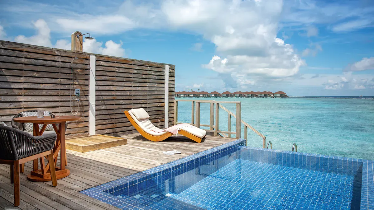 Plunge pool on an overwater deck at Sun Siyam Olhuveli