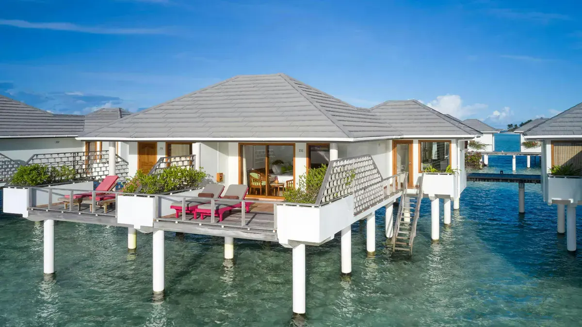 Water Villas at Villa Park Maldives over the lagoon in South Ari Atoll