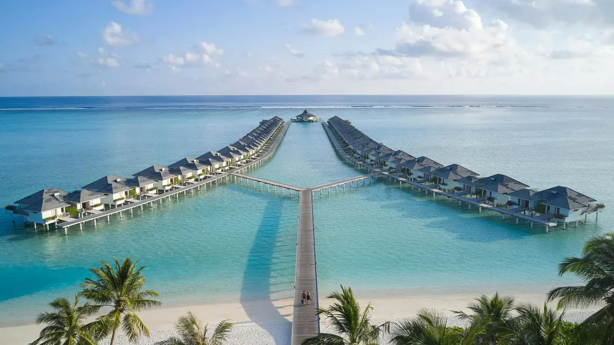 Aerial view of the overwater villa jetties at Villa Park Maldives
