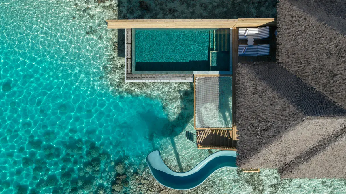 Ocean Signature Villa slide into the lagoon at Sun Siyam Vilu Reef