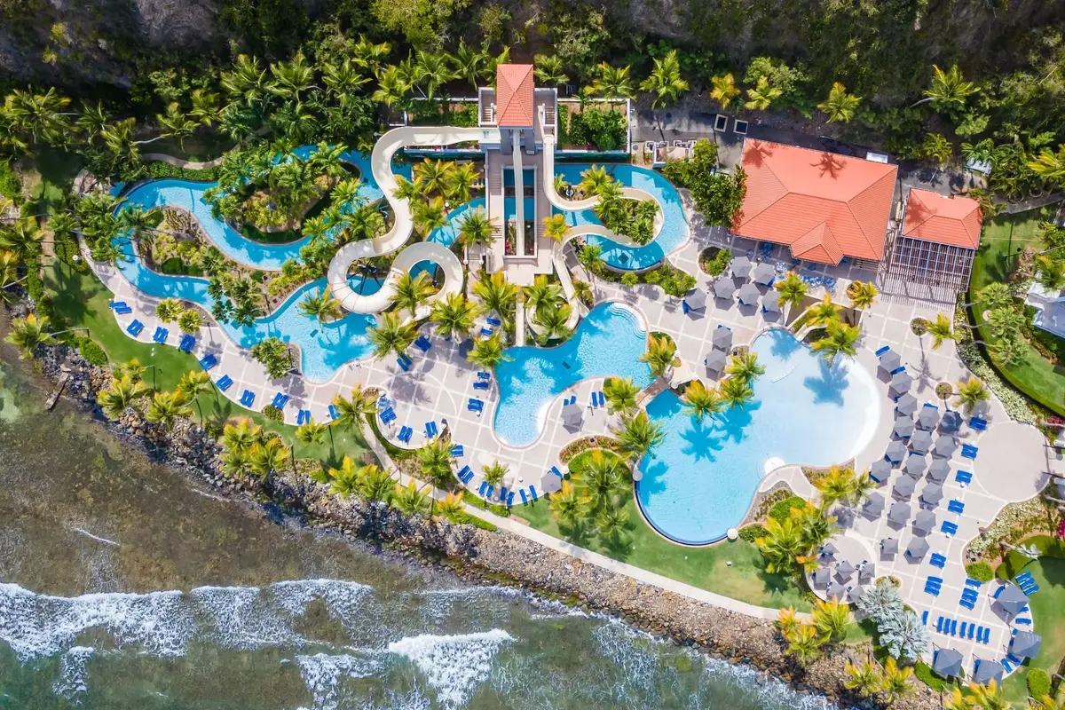 Winding white water slides, lazy river and pools at the Coqui water park from above
