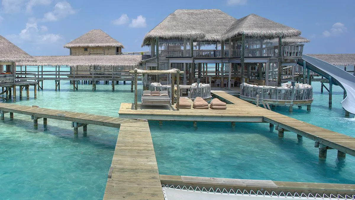 Gili Lankanfushi timber overwater residence with a private slide near Male