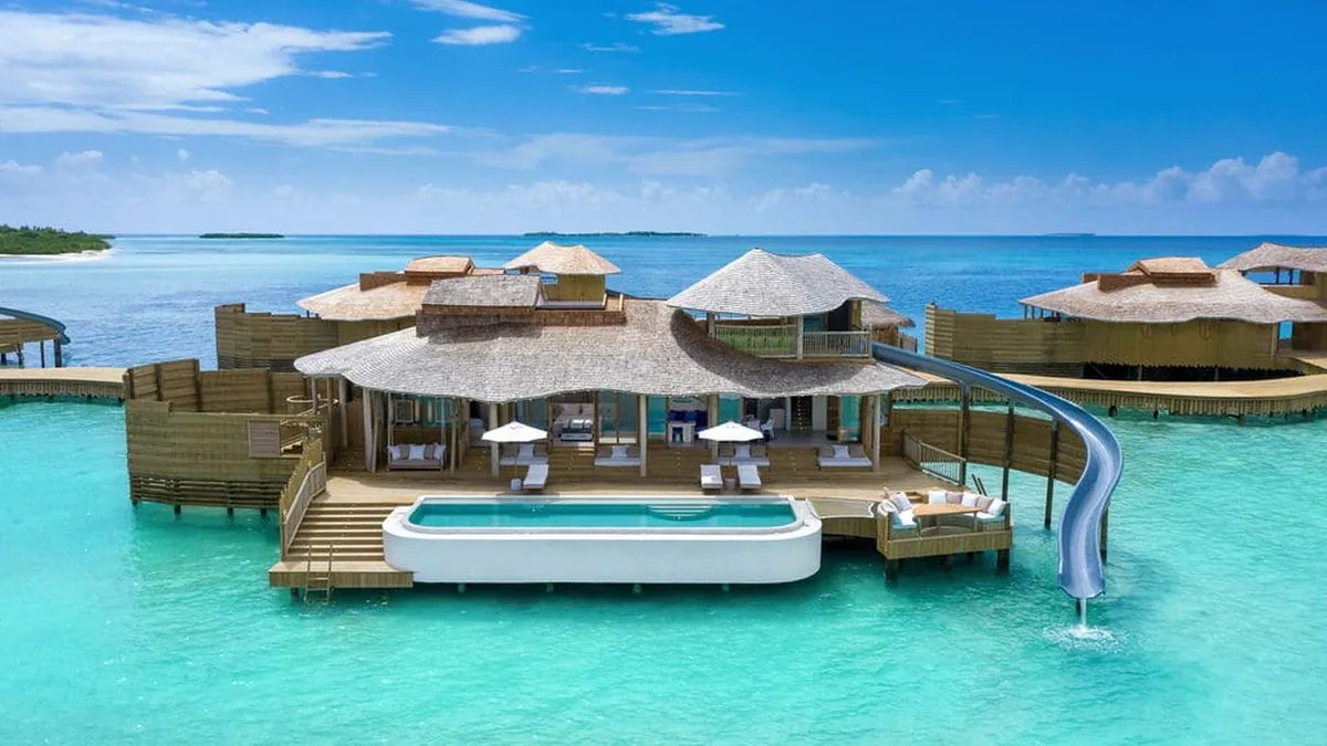 Soneva Jani overwater Water Retreat with a private slide into the Noonu Atoll lagoon