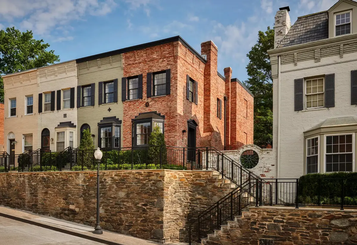 The brick and painted townhouses that form part of the Rosewood Washington DC