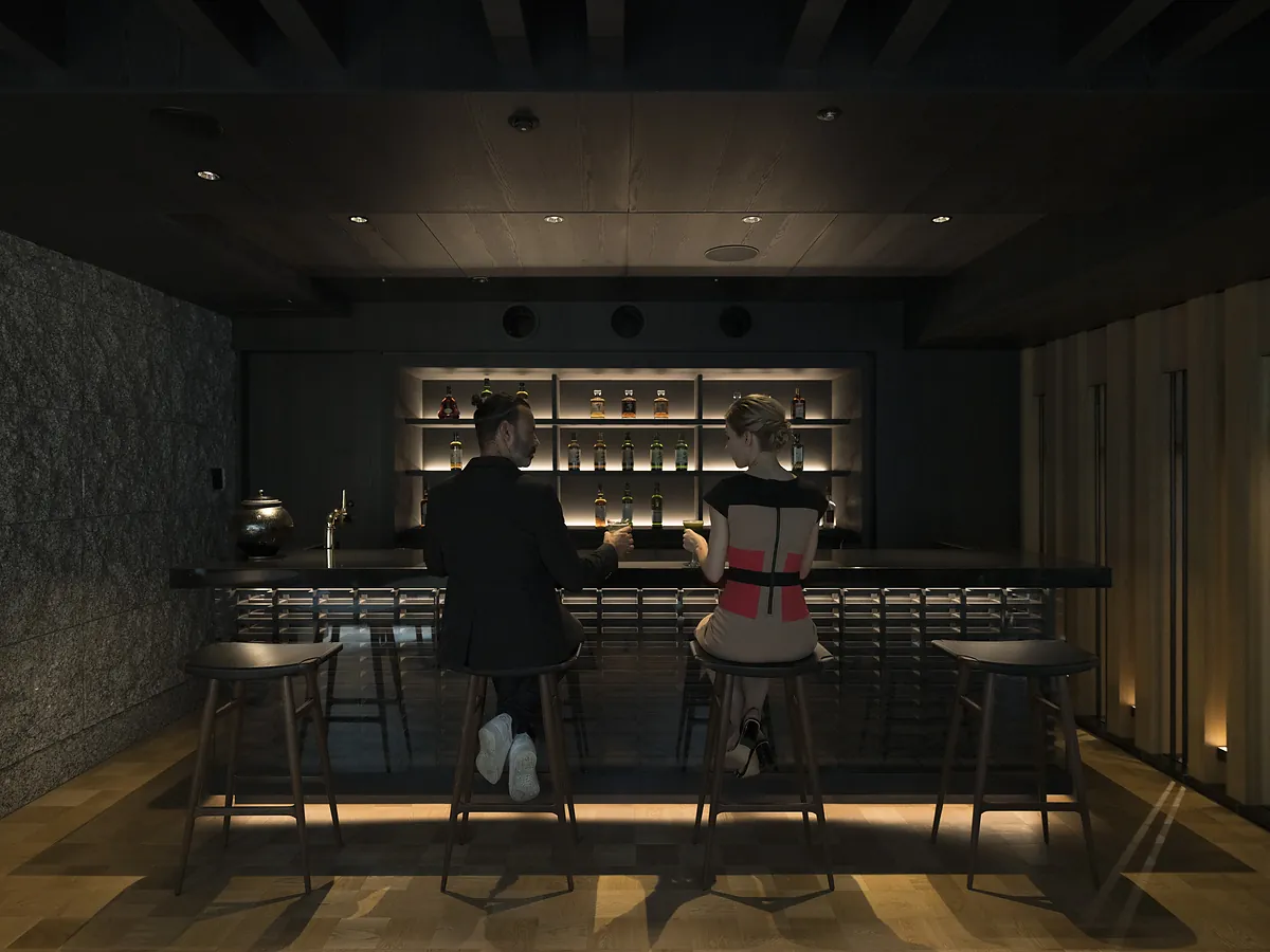 Banyan Tree Higashiyama Kyoto, two guests at the bar counter in low light, Kyoto