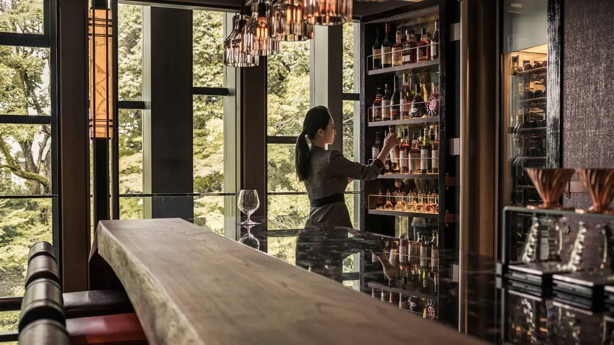 Four Seasons Hotel Kyoto, the bar counter and bottle wall, Kyoto