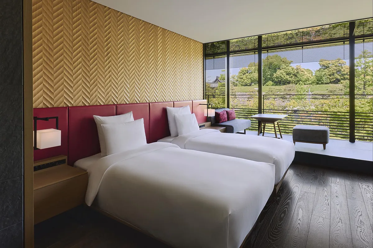 Garrya Nijo Castle Kyoto, twin beds facing full height windows over the trees, Kyoto