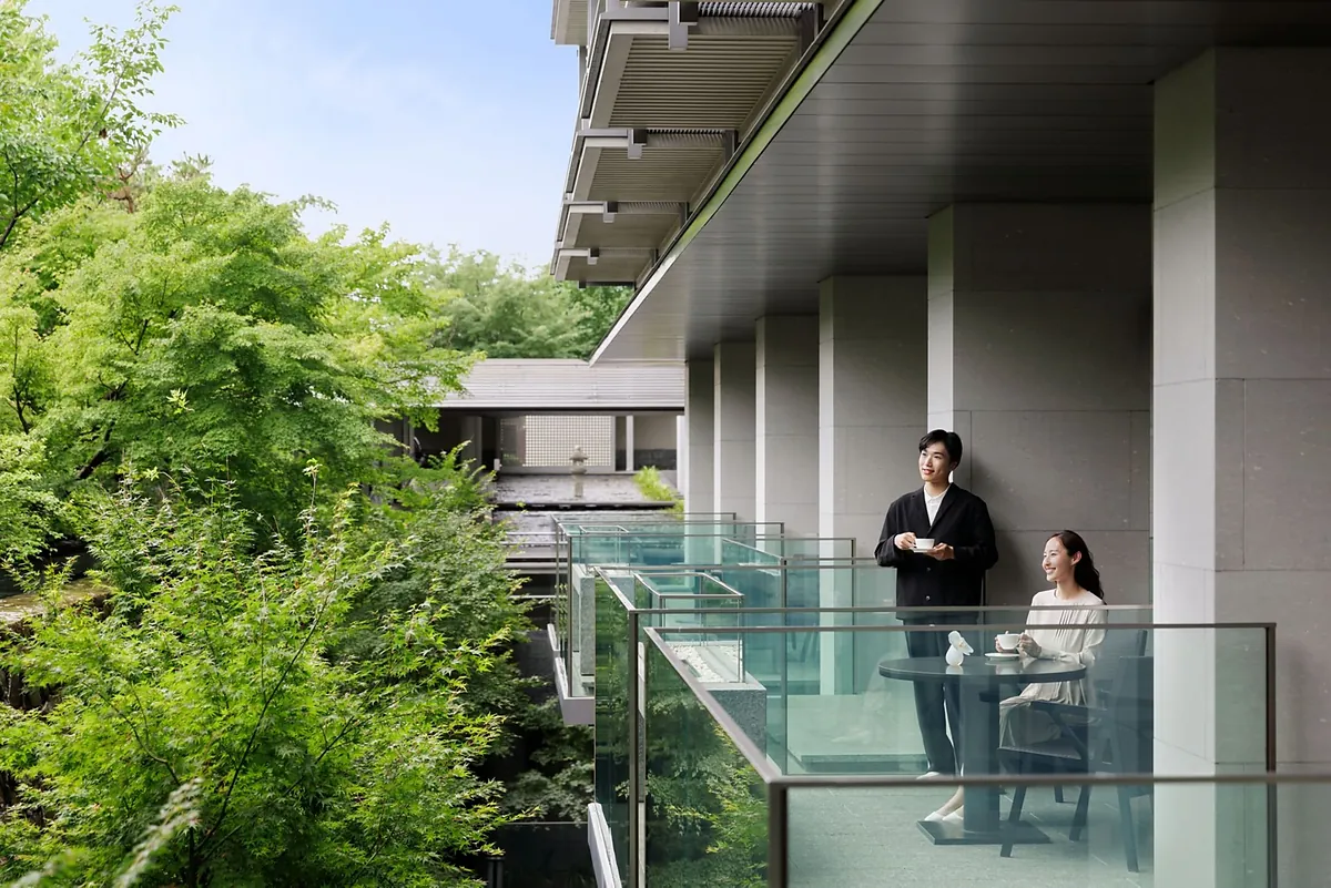 The Ritz-Carlton Kyoto, two guests on the terrace above the garden, Kyoto