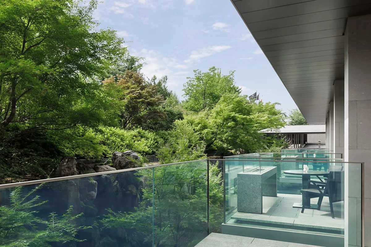 The Ritz-Carlton Kyoto, terrace seating above the river garden, Kyoto