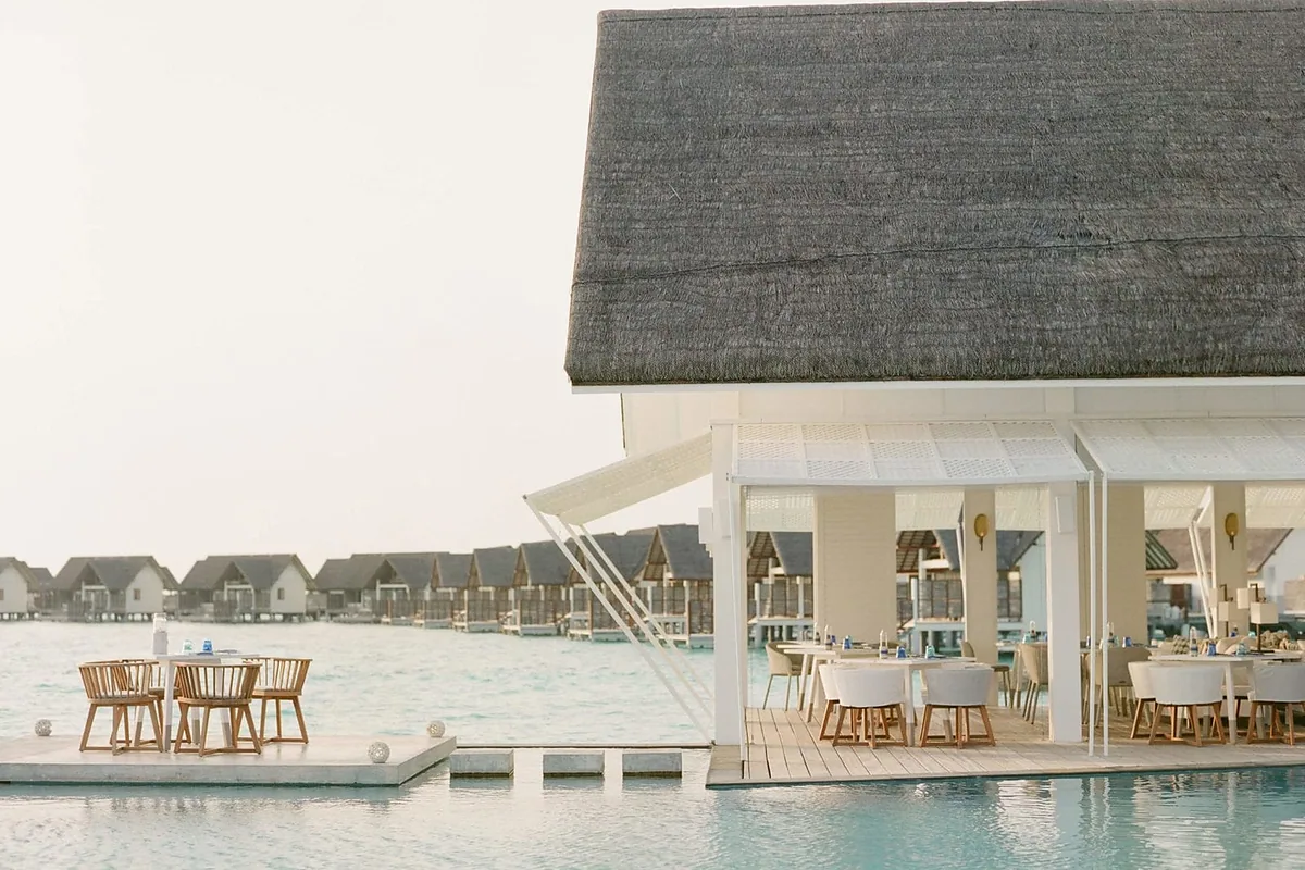 Four Seasons Landaa Giraavaru, Baa Atoll, Maldives: restaurant, bar and dining terrace, photographed for Luxury Hotel Compare
