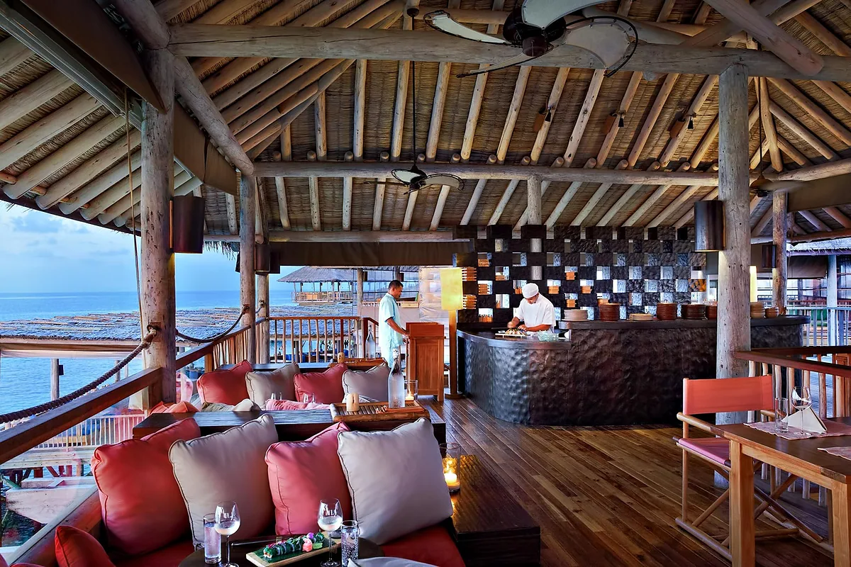 Six Senses Laamu, Laamu Atoll, Maldives: restaurant, bar and dining terrace, photographed for Luxury Hotel Compare