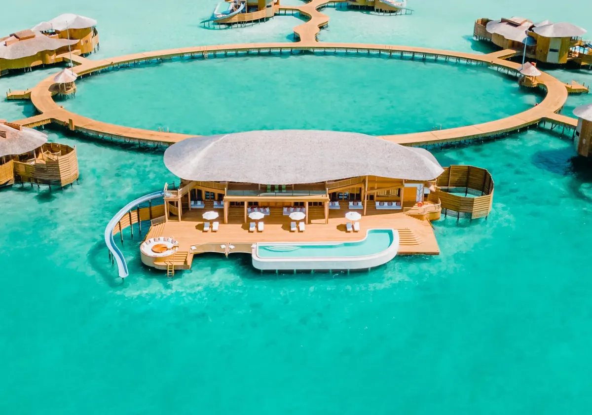 Soneva Jani vs Soneva Fushi: Overwater Drama or Barefoot Jungle?, Aerial view of Villa 105, the 4 Bedroom Sunset Water Reserve at Soneva Jani