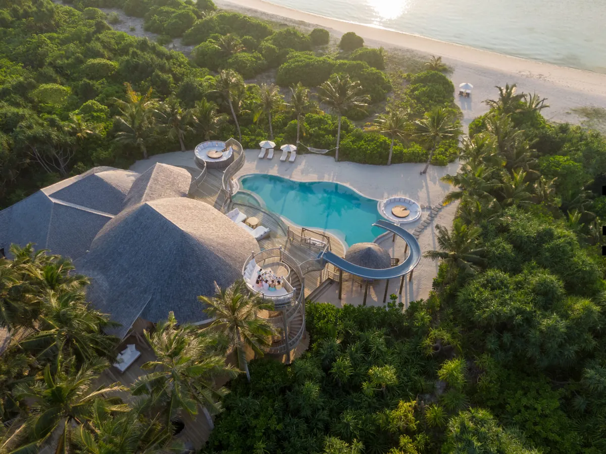 Soneva Jani Review: The Overwater Villas With Slides, Priced Honestly, Aerial view of Villa 34, the 3 Bedroom Island Reserve with Slide