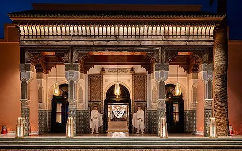 La Mamounia Marrakech gardens with palm trees and Art Deco architecture