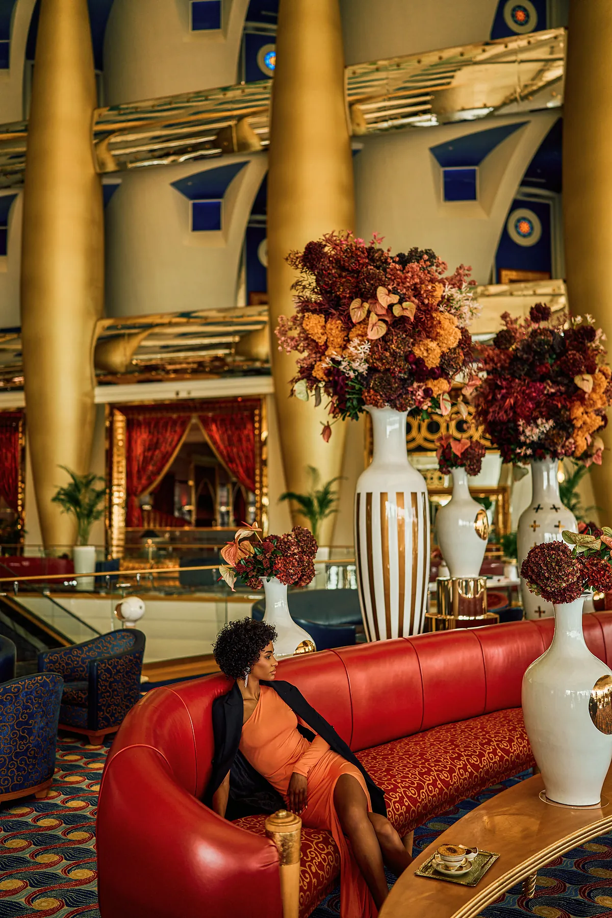 Sahn Eddar lounge beneath the atrium columns at Burj Al Arab Jumeirah