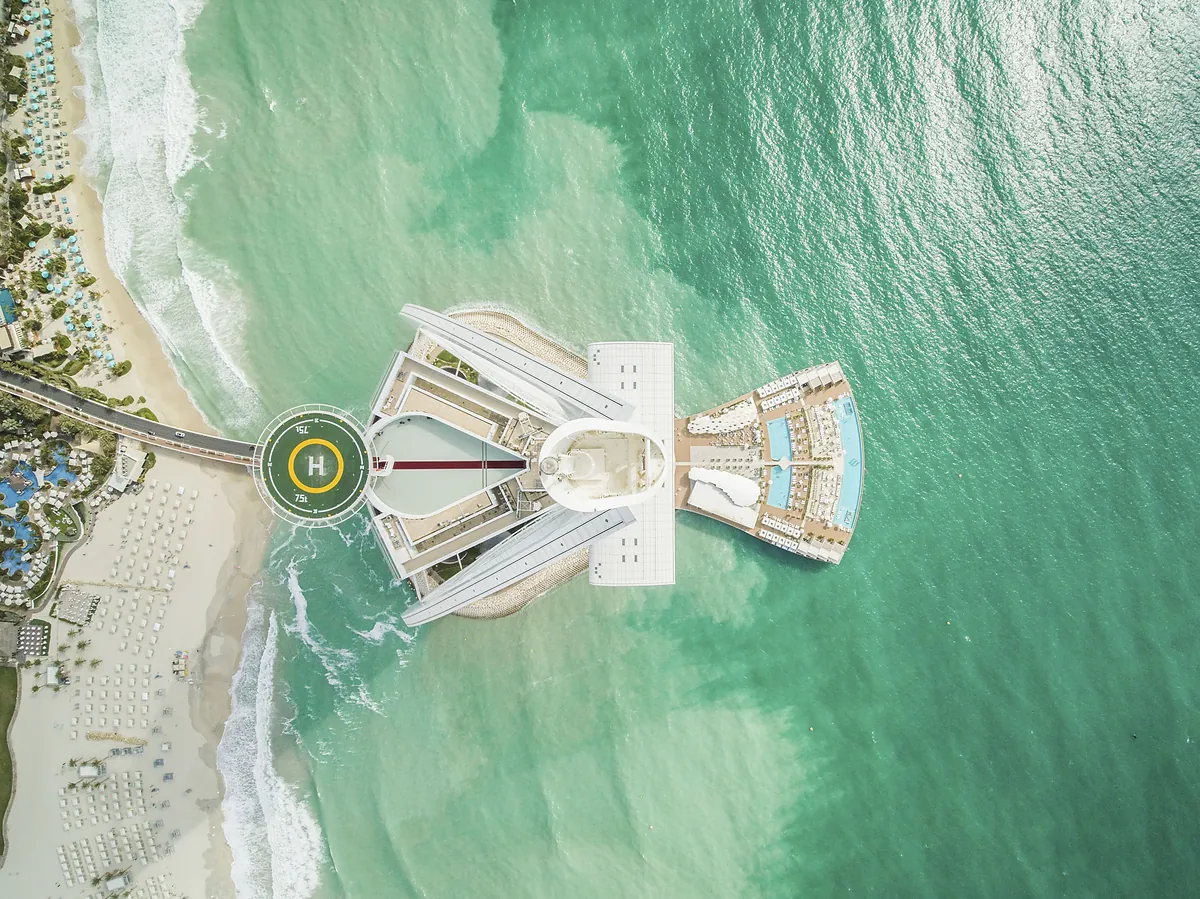 Aerial view of Burj Al Arab Jumeirah on its island off Jumeirah Beach