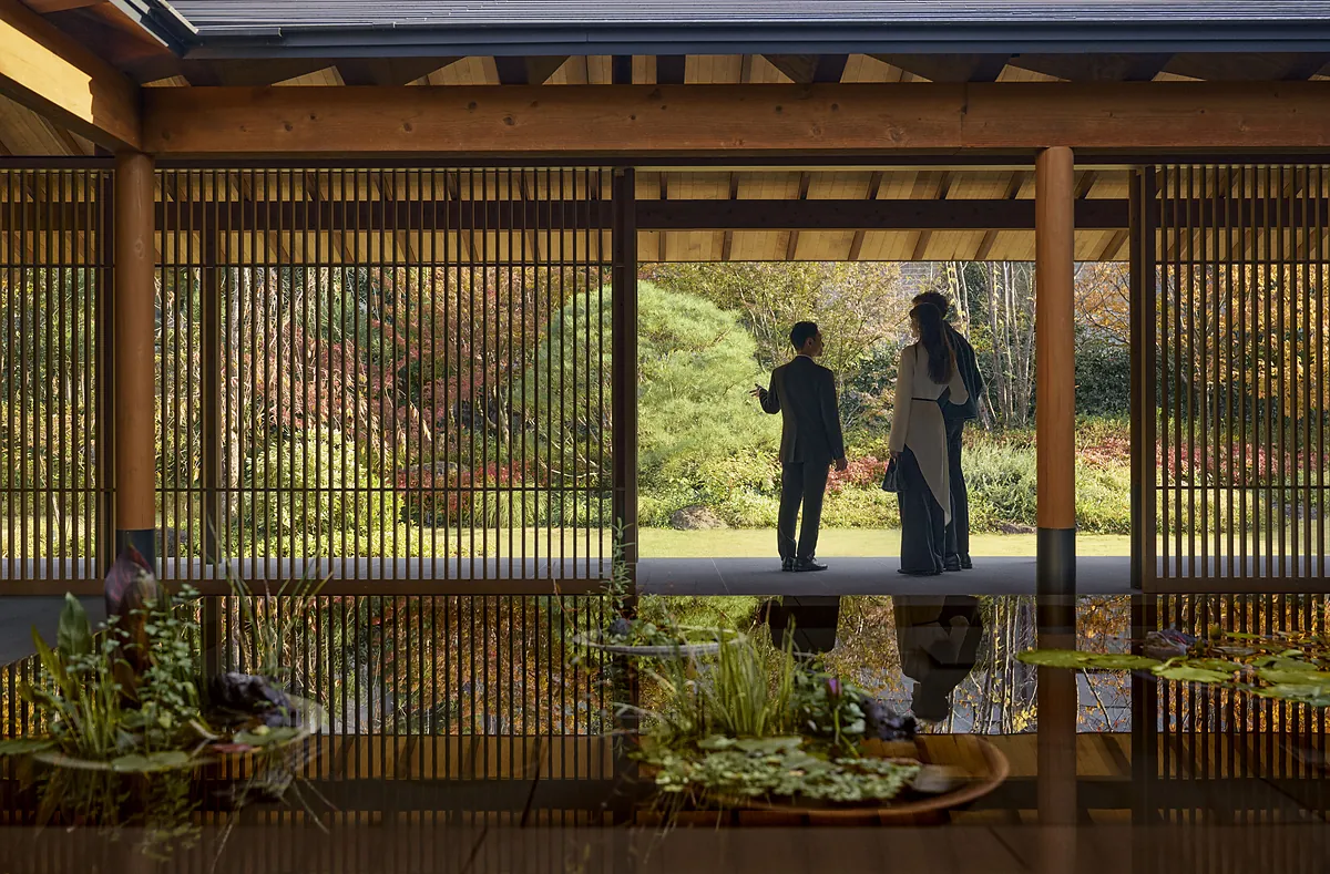 Lattice screened corridor overlooking the garden at ROKU KYOTO