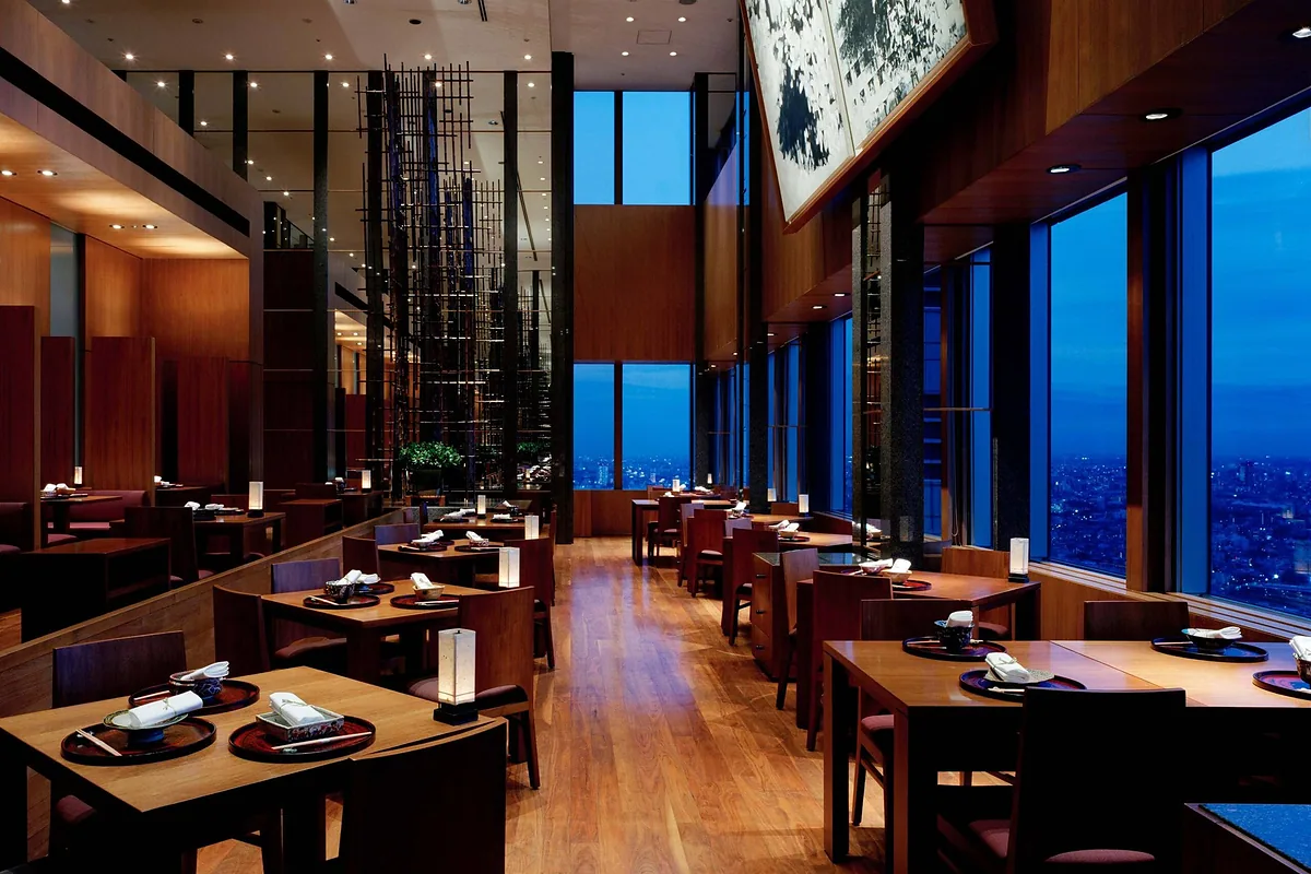 Park Hyatt Tokyo, Shinjuku, Tokyo: restaurant, bar and dining terrace, photographed for Luxury Hotel Compare