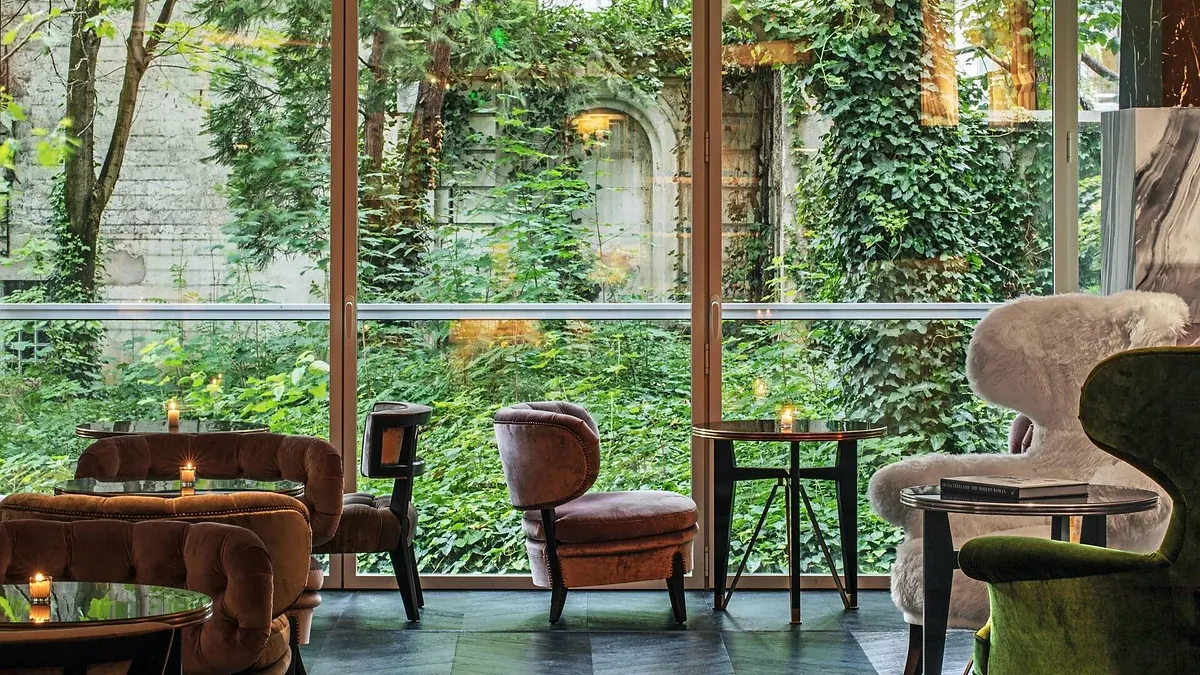 Cosy seating area with art and antiques at Hôtel de Berri Paris