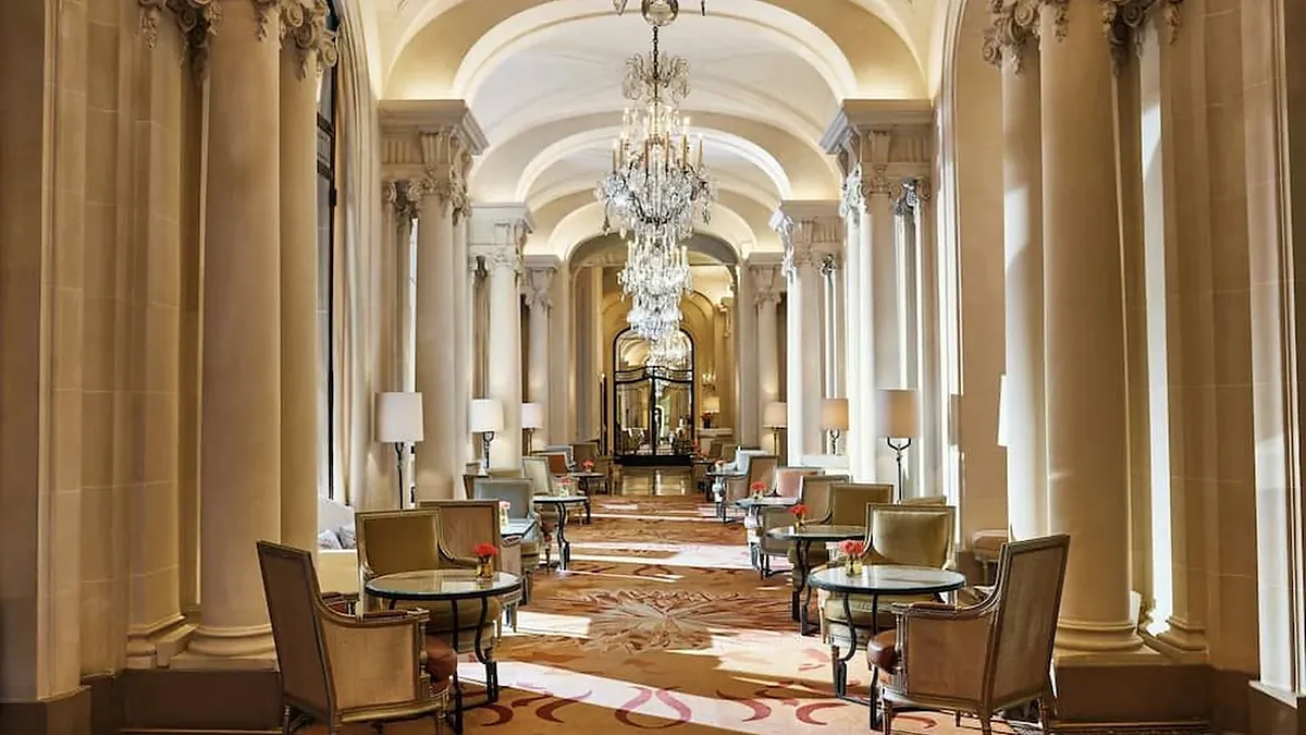 Classic bedroom in Louis XVI style at Hôtel Plaza Athénée Paris