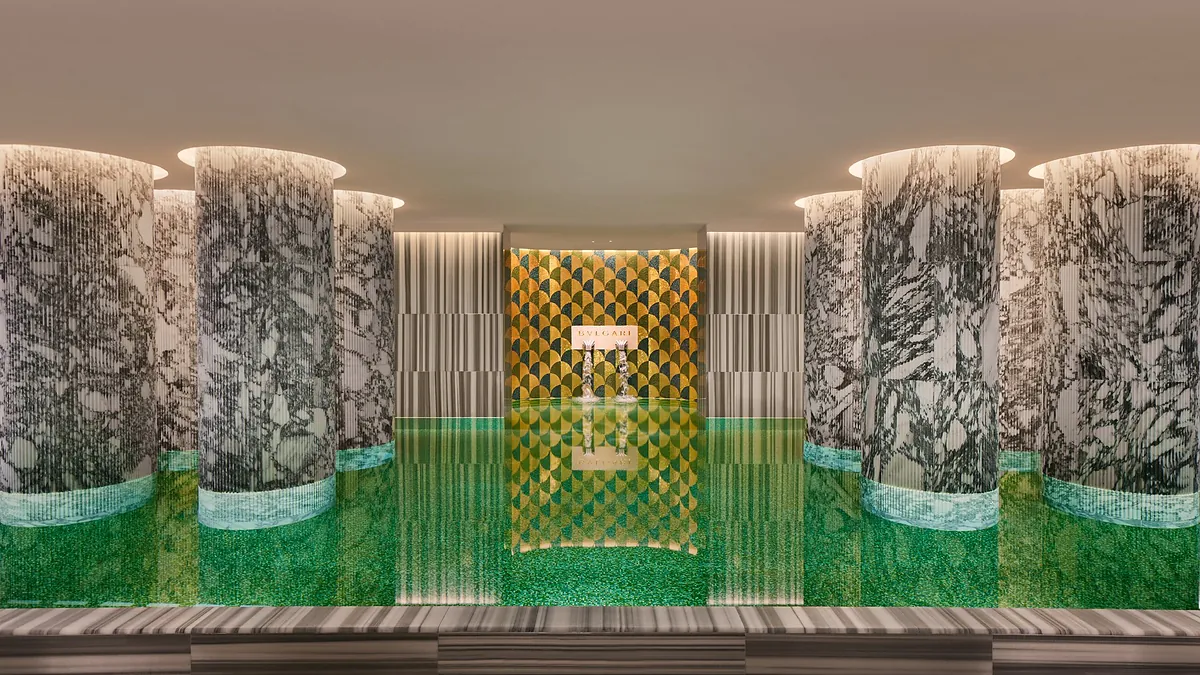 Bulgari Hotel Roma spa pool with black marble and mosaic detailing