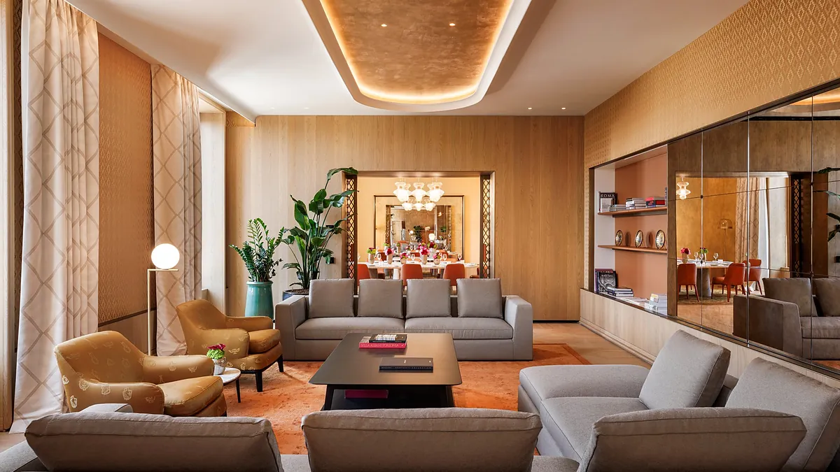 Bulgari Suite living room with Antonio Citterio furniture and travertine finishes