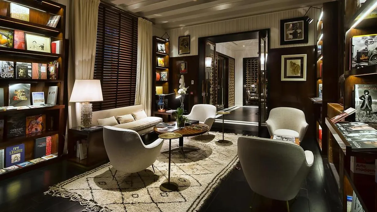 Panelled lounge at J.K. Place Roma with mid century modern furnishings