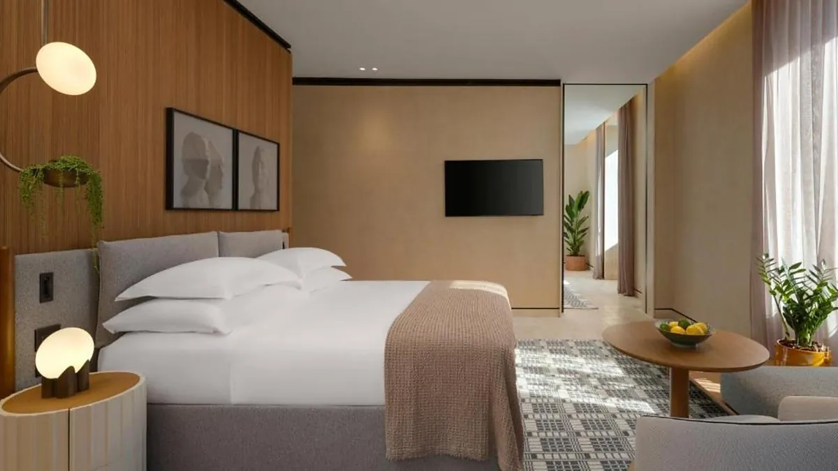 Corner Suite at Six Senses Rome with muted tones and Patricia Urquiola interiors