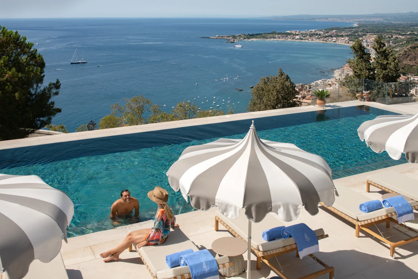 The San Domenico Palace infinity pool over the Bay of Taormina, the White Lotus Season 2 hotel