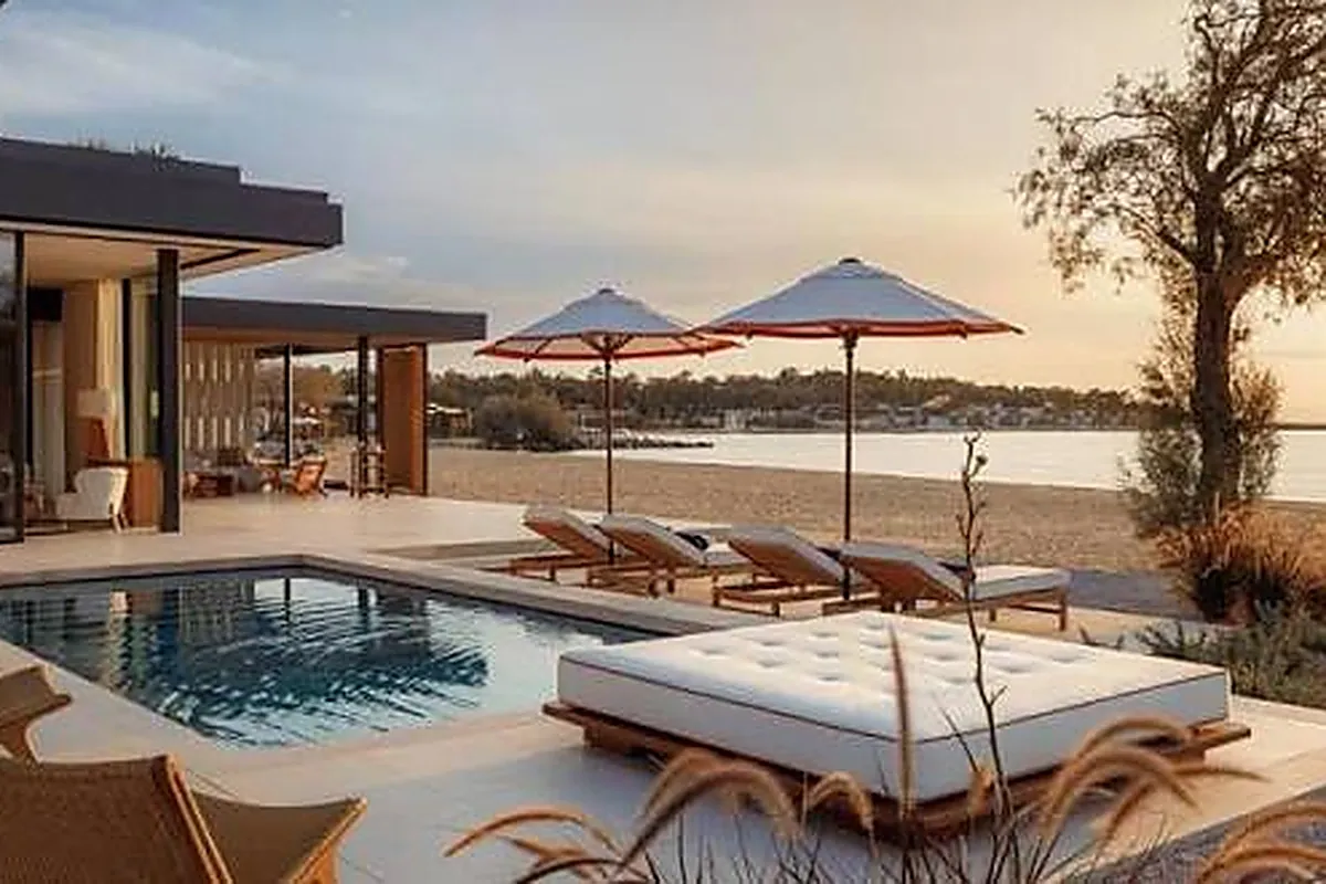 Low rise luxury bungalow with private pool set in coastal parkland near Glyfada